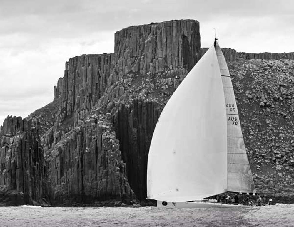 Syd Fischer's TP52 Ragamuffin rounding the Organ Pipes