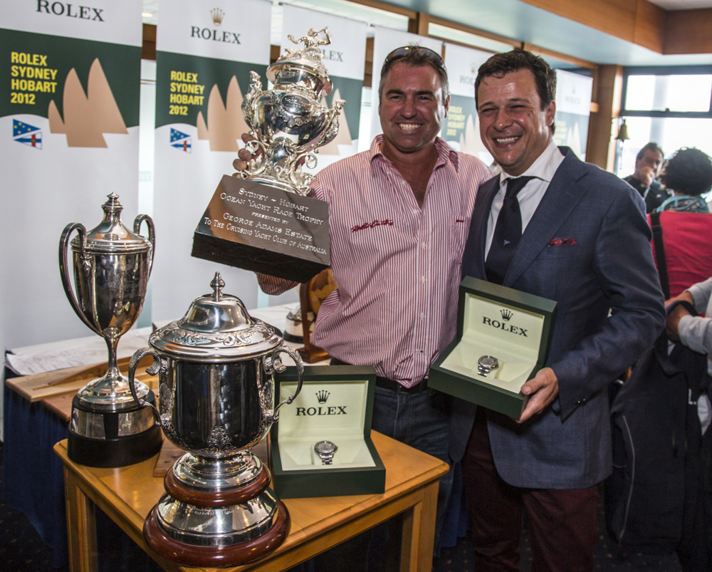 John Hilderbrand with Patrick Boutellier, Rolex Australia accepting Wild Oats XI's trophies and Yacht-Master timepieces