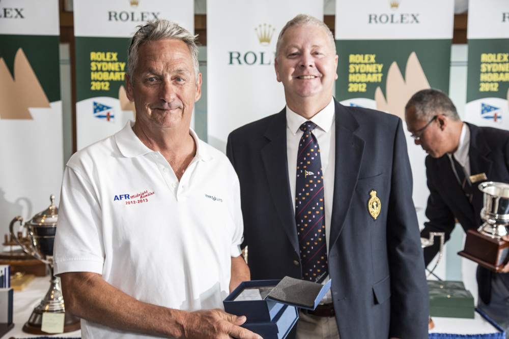 Bob Thomas, AFR Midnight Rambler receives the trophy for second IRC Division 2