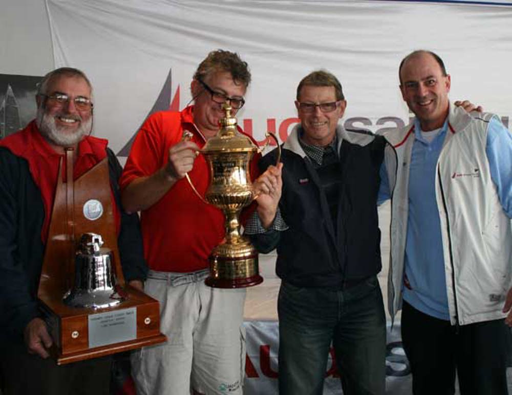 Crew members of Quantum Racing accepting their trophies