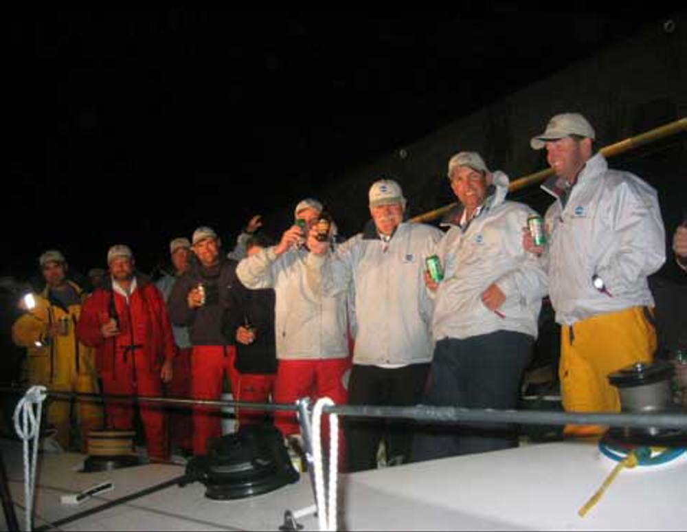 Konica crew celebrating line honours