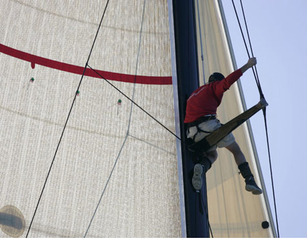 Crewman on Wild Oats searching for breeze