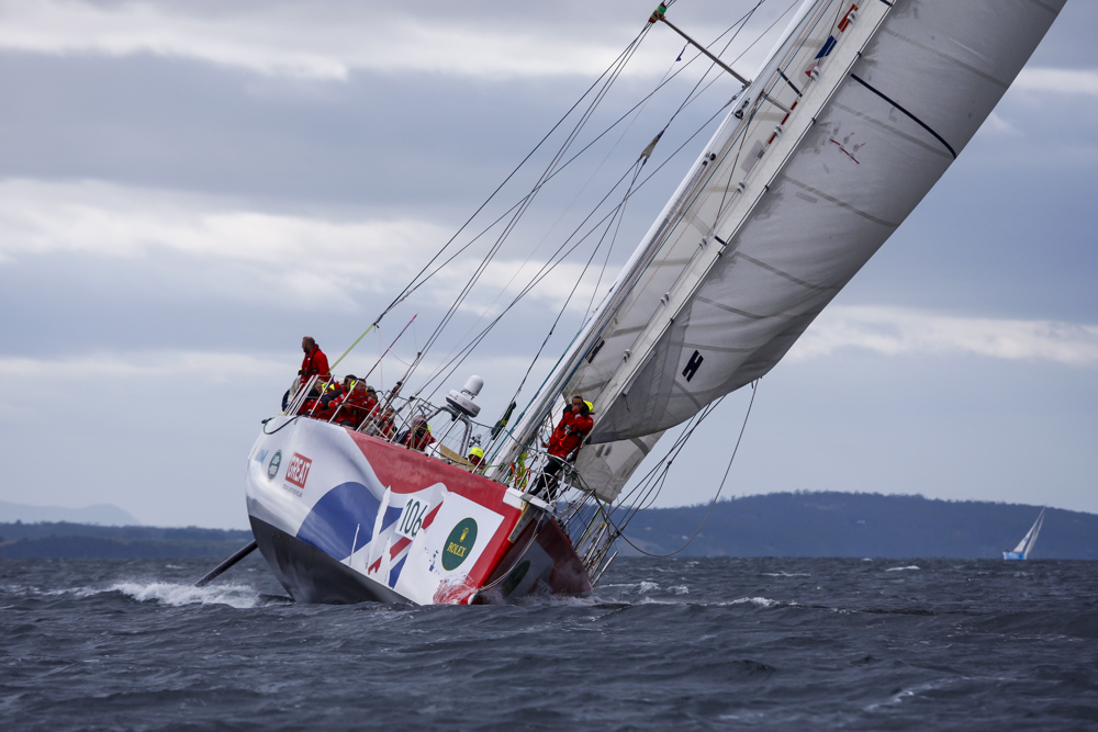 Team Great Britain make their way towards Constitition Dock as a part of the Clipper Round the World race, a category of the Sydney to Hobart yacht race at Constitution Dock in Hobart, Monday, Dec. 30, 2013. (AAP Image/Heath Holden) NO ARCHIVING, EDITORIAL USE ONLY