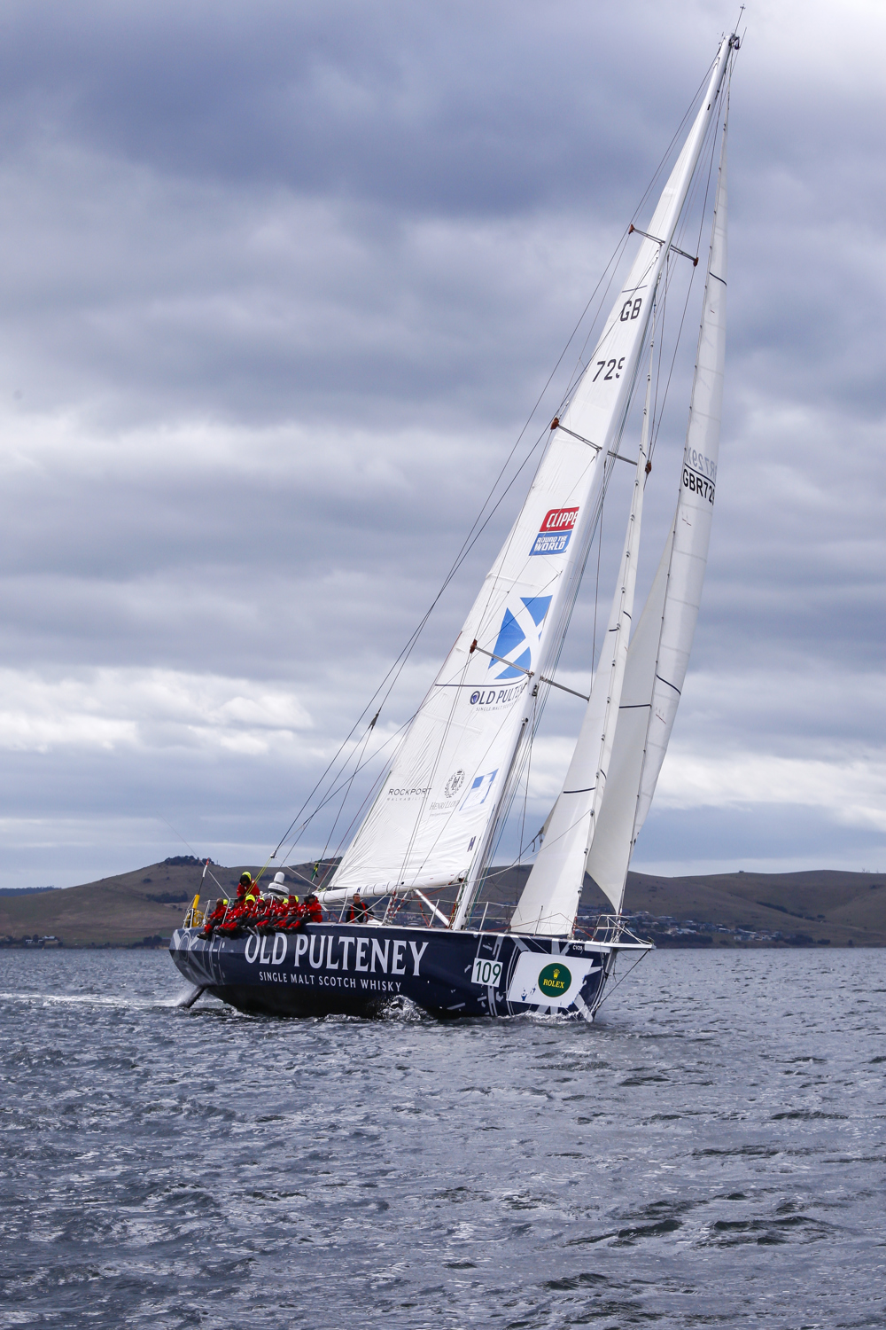 The Old Pulteney boat makes its way towards the finish line at the end of the Clipper Round the World race, a category of the Sydney to Hobart yacht race at Constitution Dock in Hobart, Monday, Dec. 30, 2013. (AAP Image/Heath Holden) NO ARCHIVING, EDITORIAL USE ONLY