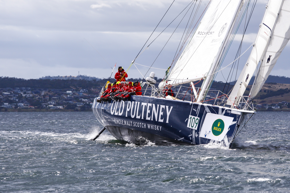 The Old Pulteney boat makes its way towards the finish line at the end of the Clipper Round the World race, a category of the Sydney to Hobart yacht race at Constitution Dock in Hobart, Monday, Dec. 30, 2013. (AAP Image/Heath Holden) NO ARCHIVING, EDITORIAL USE ONLY