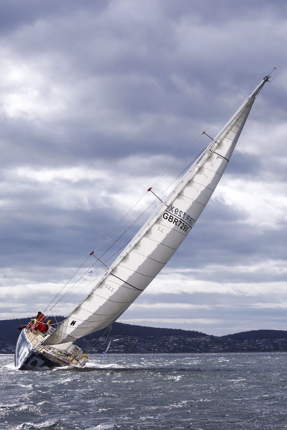 The Old Pulteney boat makes its way towards the finish line at the end of the Clipper Round the World race, a category of the Sydney to Hobart yacht race at Constitution Dock in Hobart, Monday, Dec. 30, 2013. (AAP Image/Heath Holden) NO ARCHIVING, EDITORIAL USE ONLY