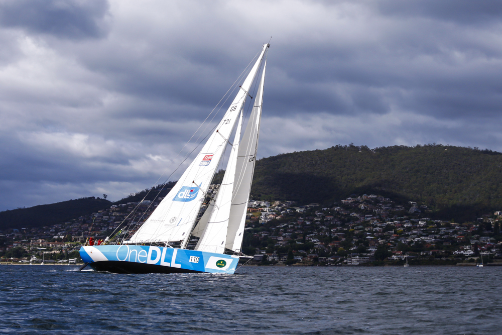 One DLL crew head up the Derwent River towards the line at the end of the Clipper Round the World race, a category of the Sydney to Hobart yacht race at Constitution Dock in Hobart, Monday, Dec. 30, 2013. (AAP Image/Heath Holden) NO ARCHIVING, EDITORIAL USE ONLY