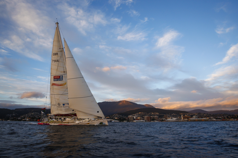 Derry~Londonderry~Doire is the first to sail up the Derwent river as a part of the Clipper Round the World race, a category of the Sydney to Hobart yacht race at Constitution Dock in Hobart, Monday, Dec. 30, 2013. (AAP Image/Heath Holden) NO ARCHIVING, EDITORIAL USE ONLY