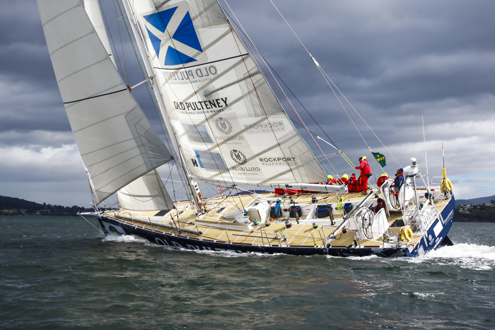 The Old Pulteney boat makes its way towards the finish line at the end of the Clipper Round the World race, a category of the Sydney to Hobart yacht race at Constitution Dock in Hobart, Monday, Dec. 30, 2013. (AAP Image/Heath Holden) NO ARCHIVING, EDITORIAL USE ONLY