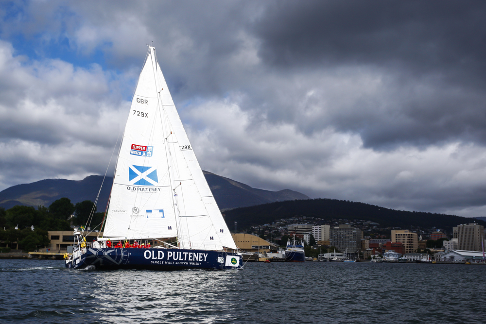 The Old Pulteney boat makes its way towards the finish line at the end of the Clipper Round the World race, a category of the Sydney to Hobart yacht race at Constitution Dock in Hobart, Monday, Dec. 30, 2013. (AAP Image/Heath Holden) NO ARCHIVING, EDITORIAL USE ONLY