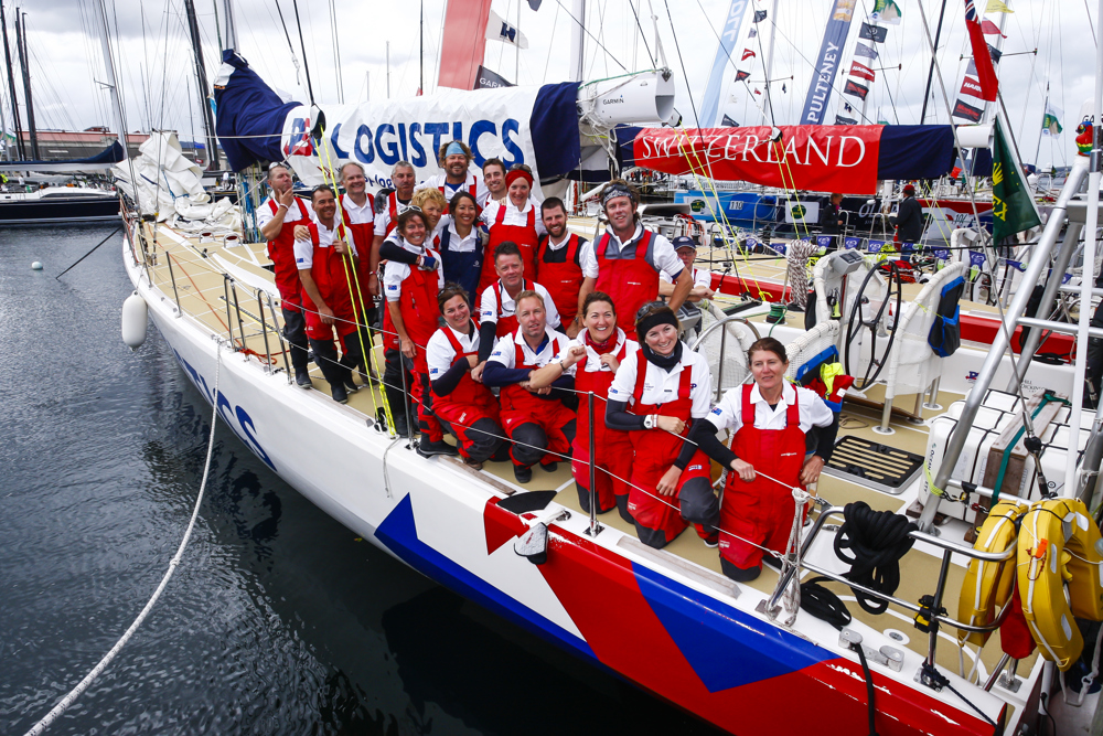The PSP Logistics celebrate at the end of the Clipper Round the World race, a category of the Sydney to Hobart yacht race at Constitution Dock in Hobart, Monday, Dec. 30, 2013. (AAP Image/Heath Holden) NO ARCHIVING, EDITORIAL USE ONLY