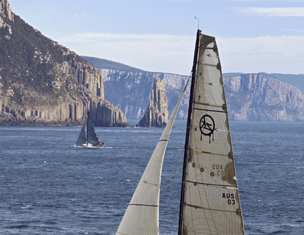 Matt Allen's Ichi Ban sails near Alan Brierty's Limit in the 64th Rolex Sydney to Hobart Yacht Race.