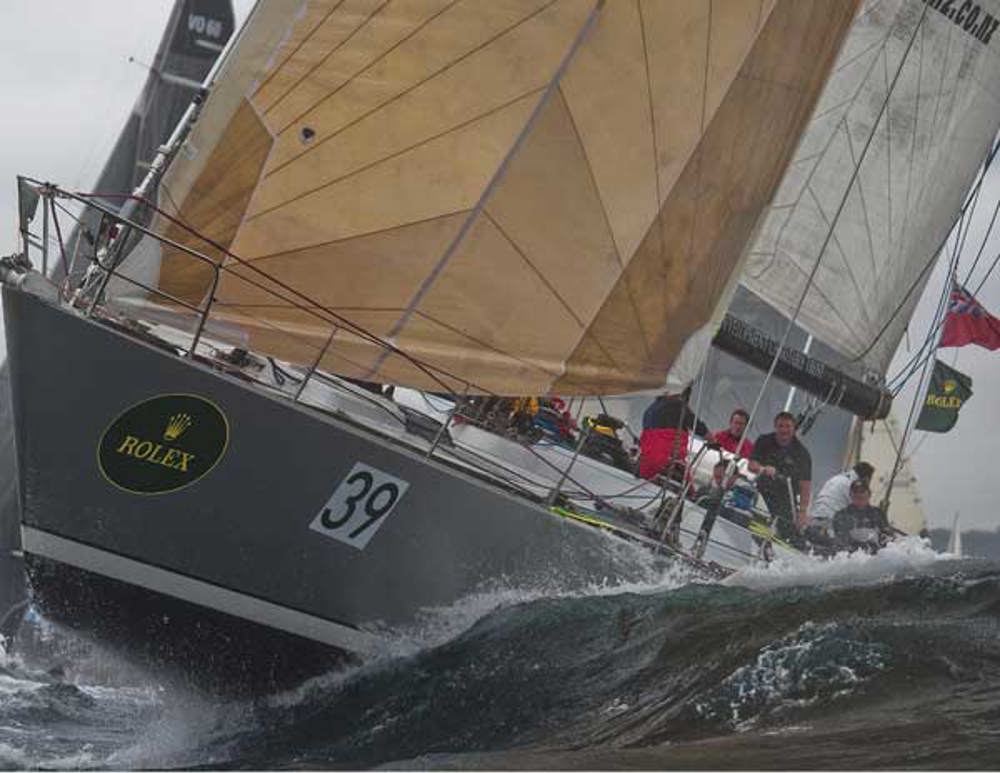 Lion New Zealand, skippered by Alistair Moore, making their way through Sydney Heads