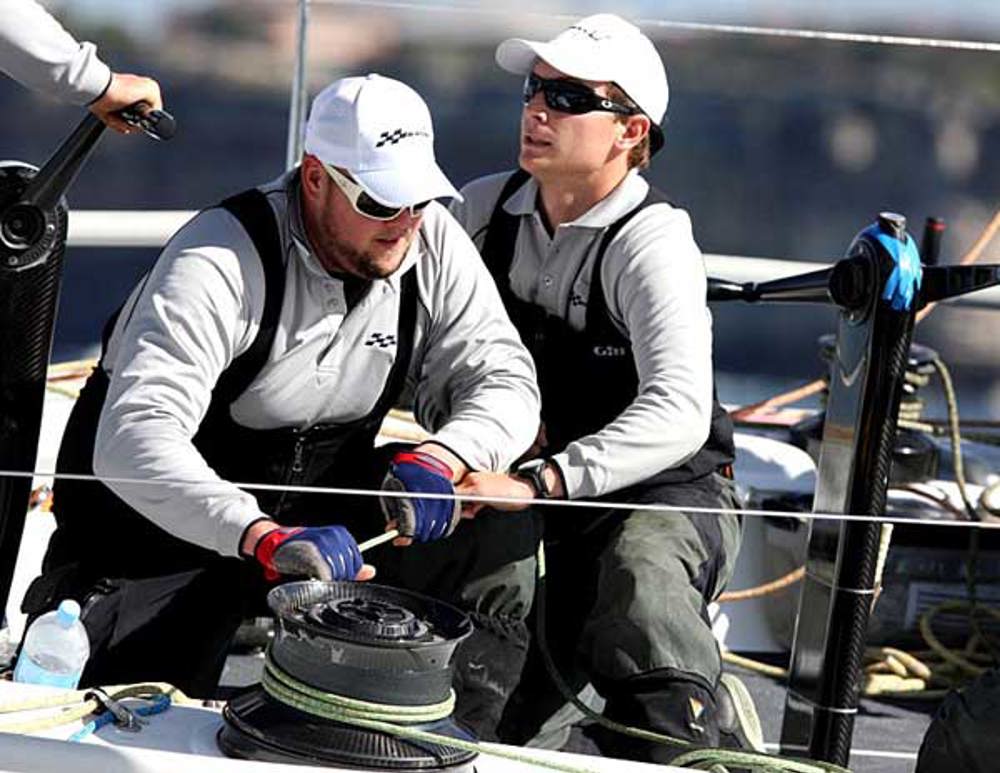 Black Jack crew in action during the start of the Audi Sydney Gold Coast Yacht Race 2010