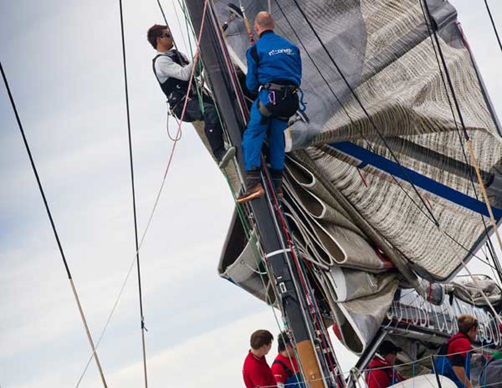 YuuZoo crew members making final pre-race adjustments