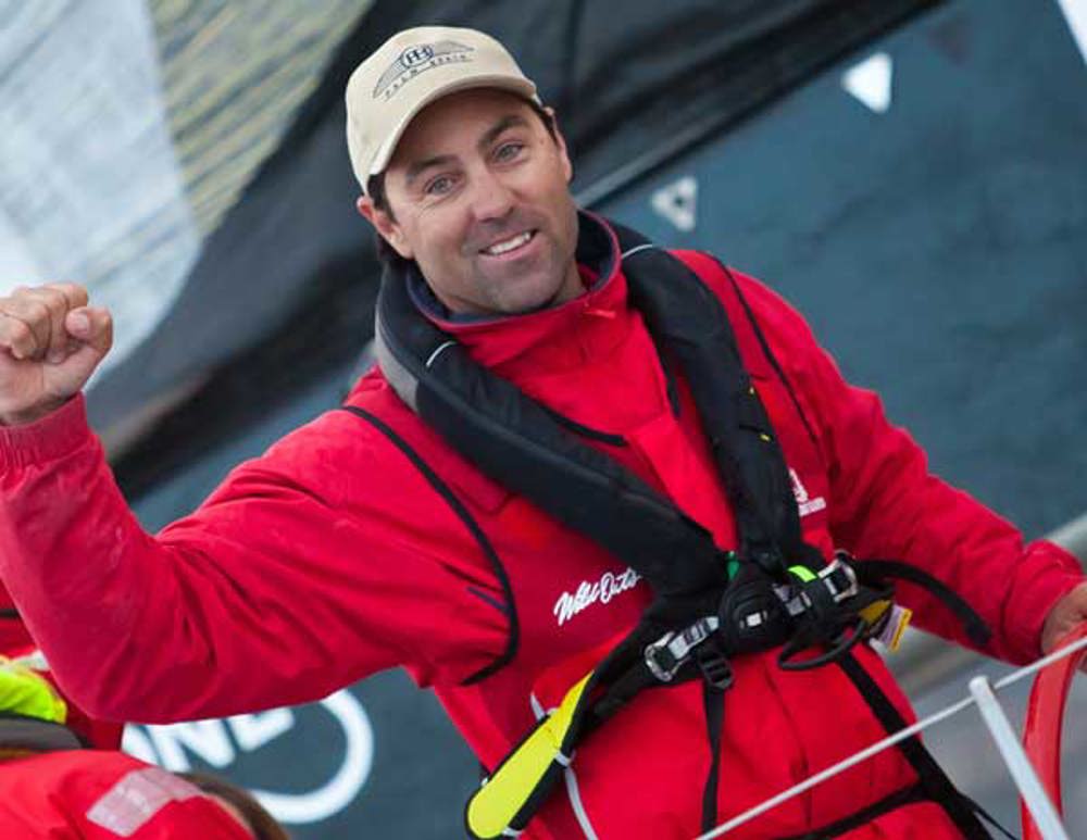 Mark Richards, skipper Wild Oats XI, celebrates crossing the finish line first in the 2010 Rolex Sydney Hobart, claiming a fifth provisional line honours win