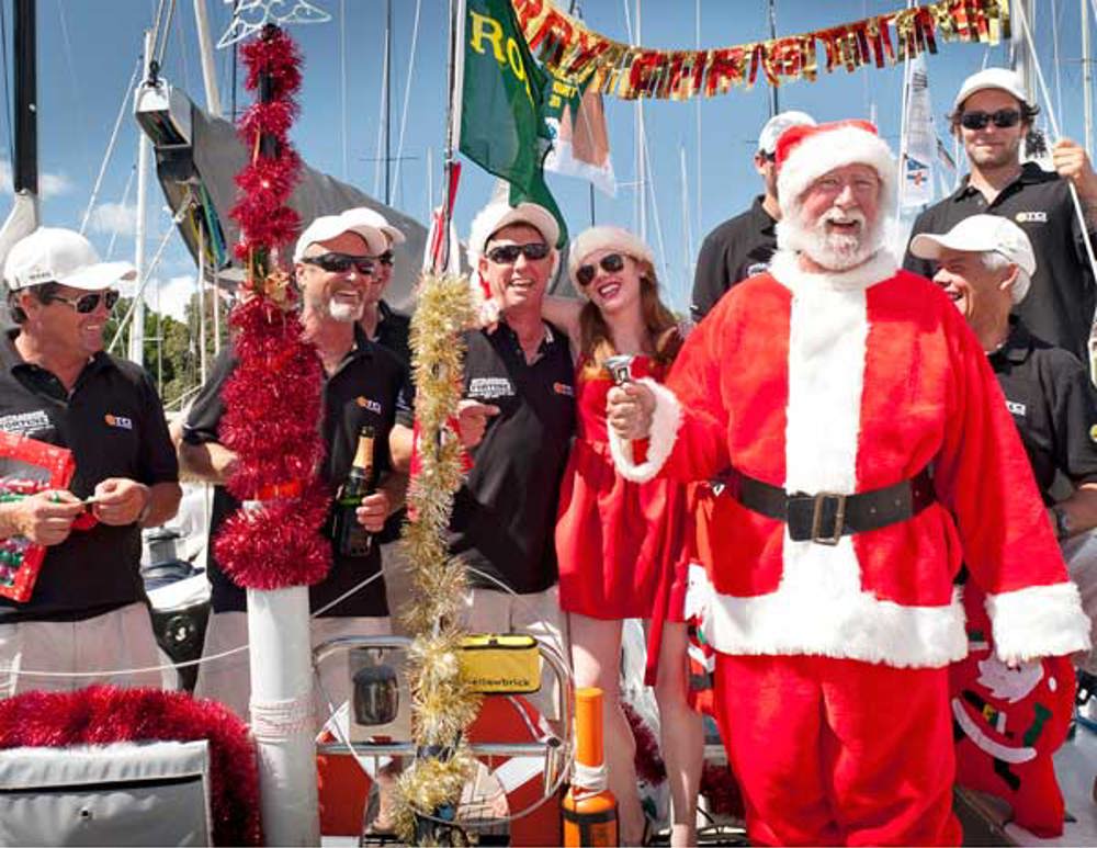 Santa Claus and the crew from Outrageous Fortune celebrate Christmas in Australia