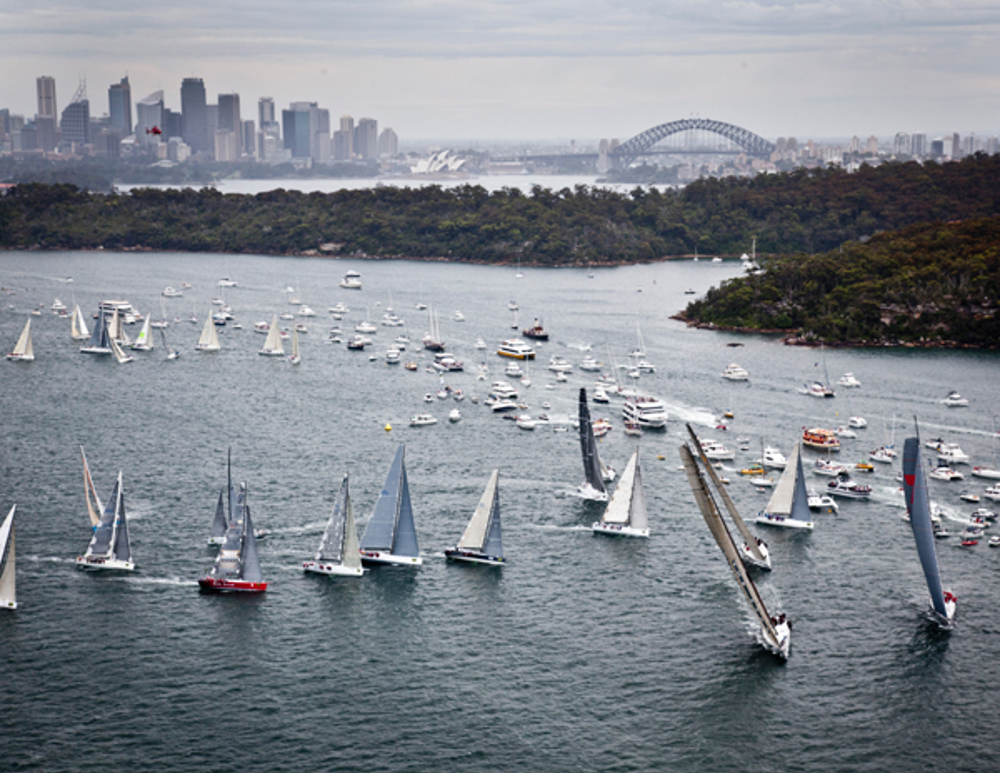 The fleet gets close to the spectators soon after the start