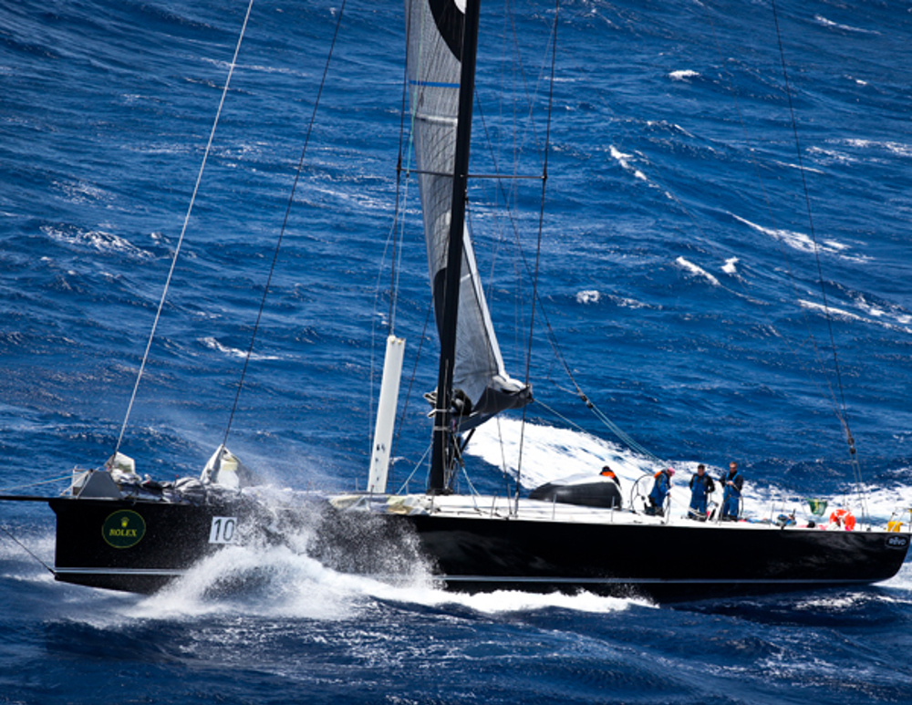 Grant Wharington's maxi Wild Thing returns to Sydney after retiring on the 2nd day with sail damage