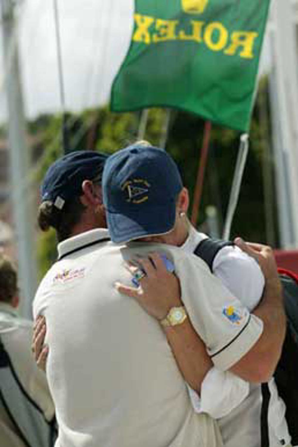 Well wishers farewell crew on the CYCA marina.