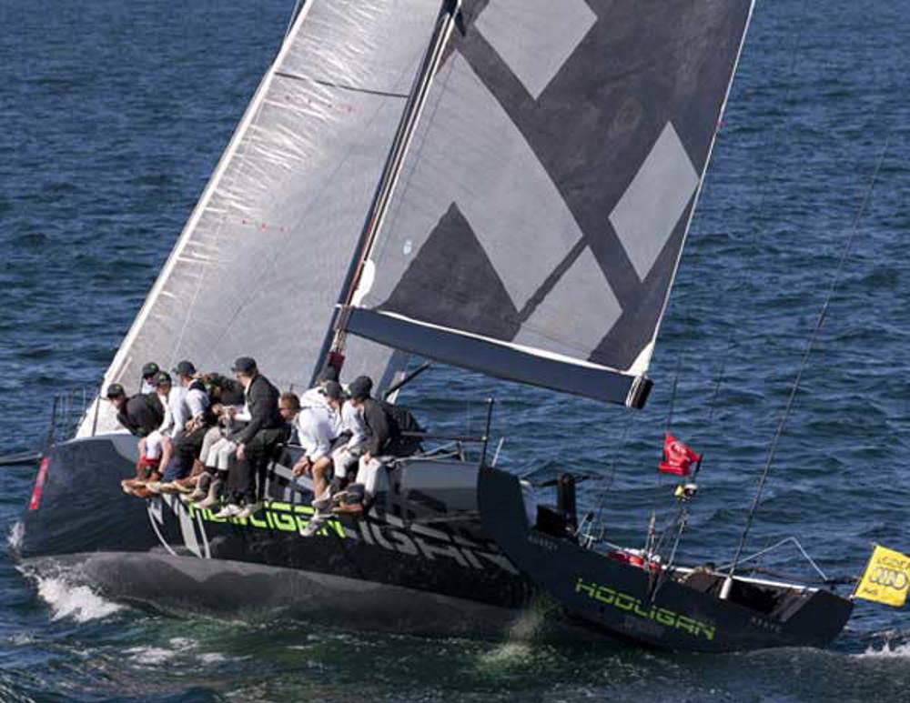 Marcus Blackmore's TP52 Hooligan in a stoush with other TP52s Ragamuffin and Wot Eva