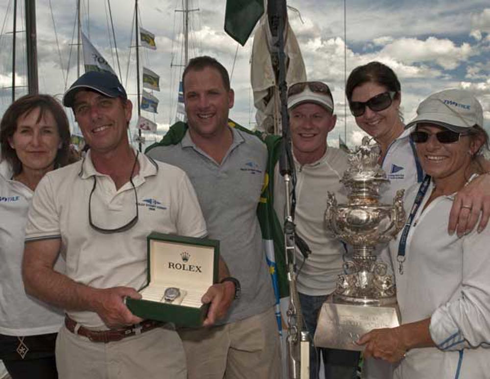 The crew of Two True celebrate after receiving the Tattersall's Cup dockside and the Rolex Yacht-Master timepiece