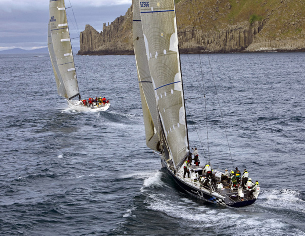 Peter Harburg's Black Jack chases Stephen Ainsworth's Loki in the 64th Rolex Sydney Hobart Yacht Race