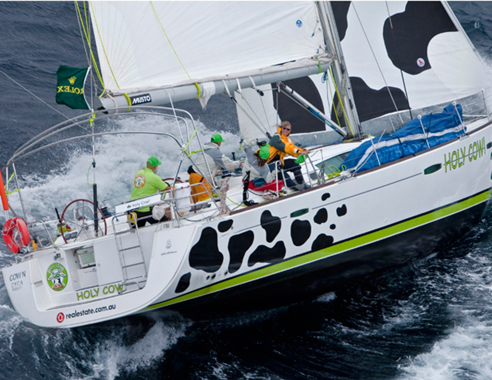 Holy Cow! starting its trip South, shortly after rounding the sea mark off Sydney Heads