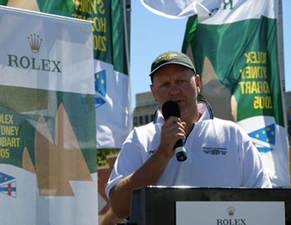 David Ferrall, skipper of Pekljus, accepts the divisional winners battle flag from Matteo Mazzanti of Rolex