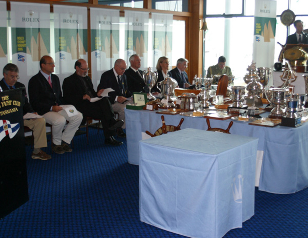 Dr Dan Norton, Tasports; Matteo Mazzanti, Rolex SA; Rob Valentine, Lord Mayor of Hobart; CYCA Commodore Geoff Lavis; His Excellency, The Honourable William Cox, Governor of Tasmania; RYCT Commodore Marion Cooper; Doug Parkinson