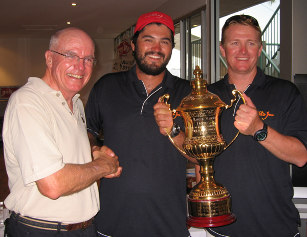 CYCA Commodore Geoff Lavis congratulates the crew of Wild Joe on their IRC overall win