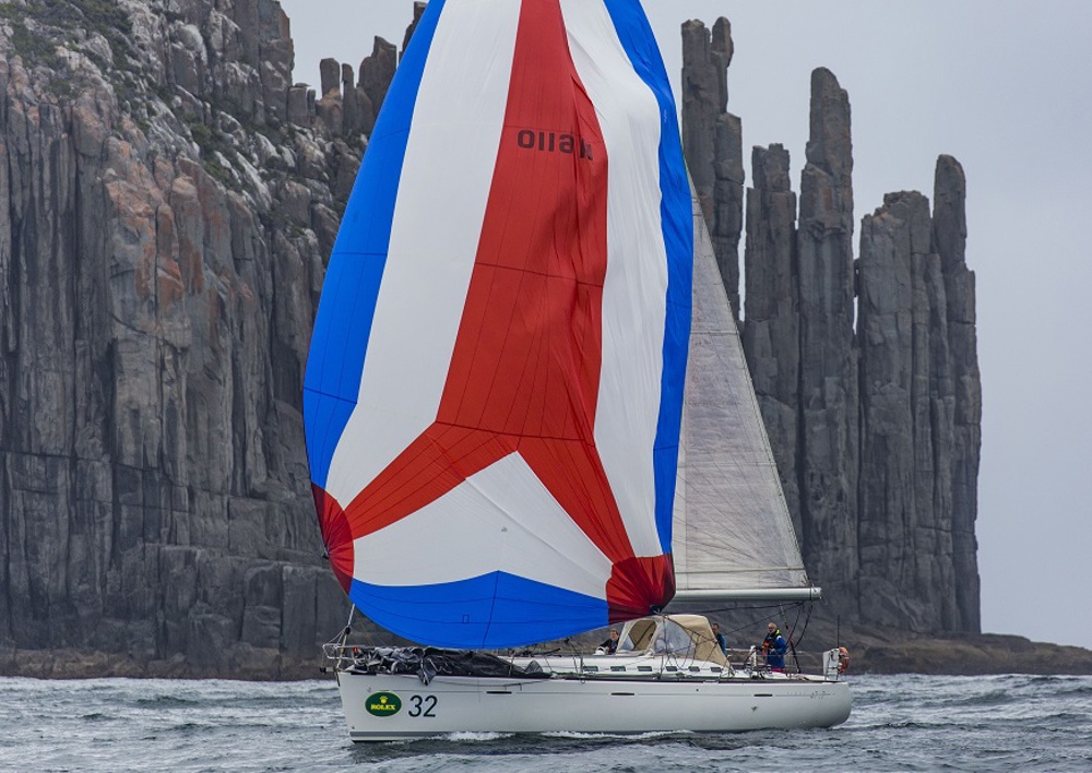 Samskara passes the organ pipes at Cape Raoul sailing to Hobart