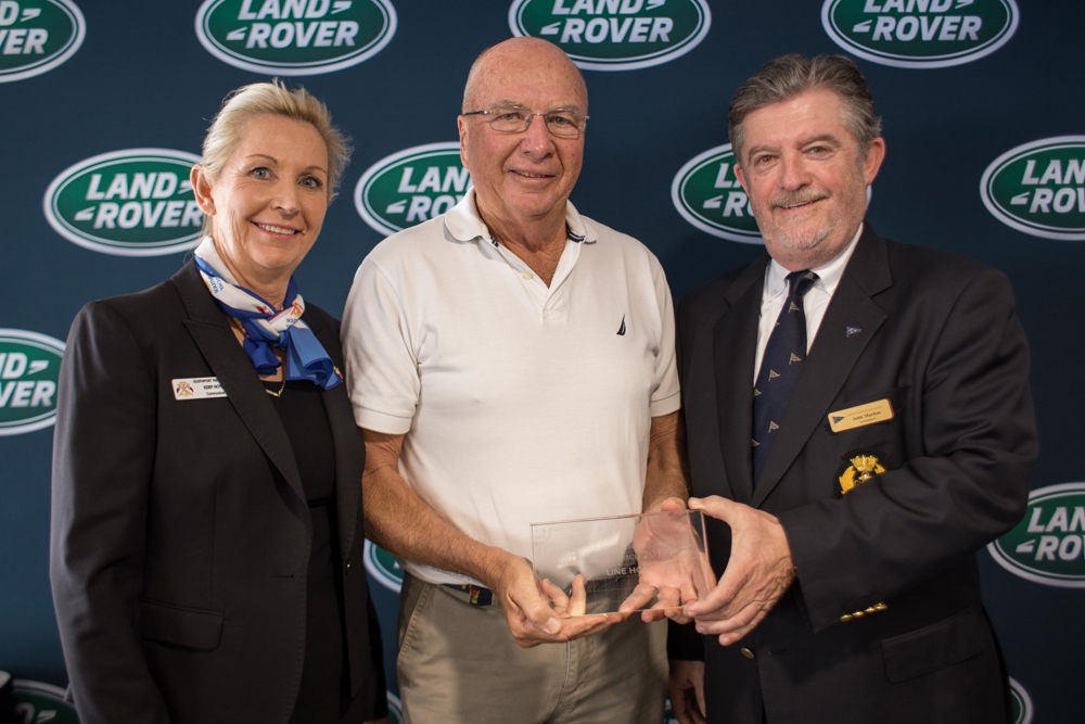 Rob Mundle collecting the 2017 line honours winner's prize on behalf of Wild Oats