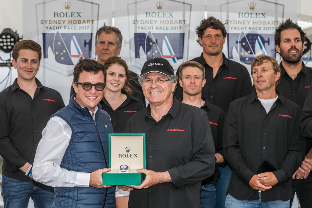 Patrick Boutellier, General Manager of Rolex Australia, presents Line Honours winner Jim Cooney, owner and skipper of LDV Comanche with a Rolex Timepiece