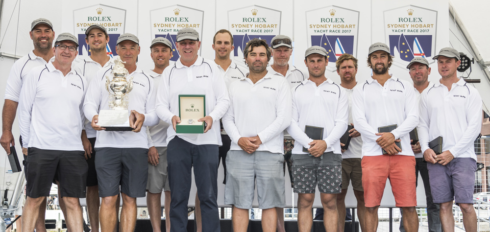 The crew of Ichi Ban with the Tattersalls Cup for Overall Winner of the Rolex Sydney Hobart