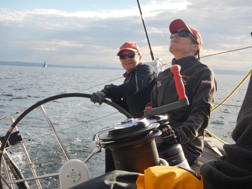 Louise Stevenson steering Wax Lyrical, with Dinah Eagle trimming, as they head North