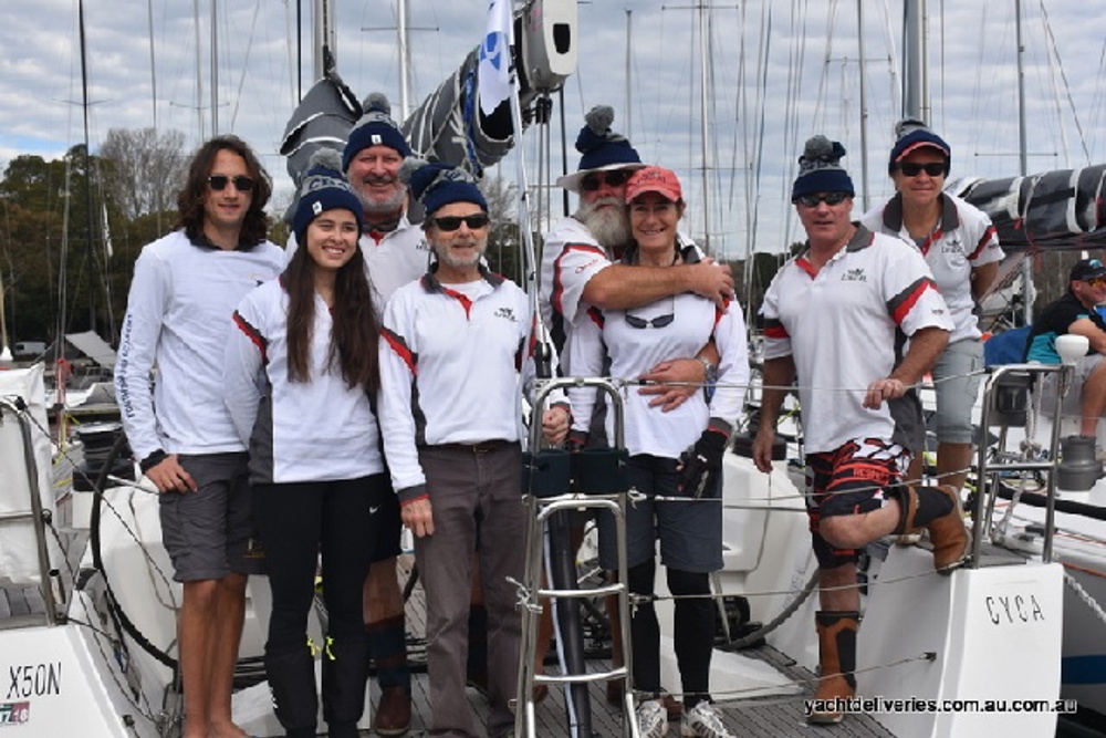 The crew of Wax Lyrical prior to leaving the CYCA marina for the start