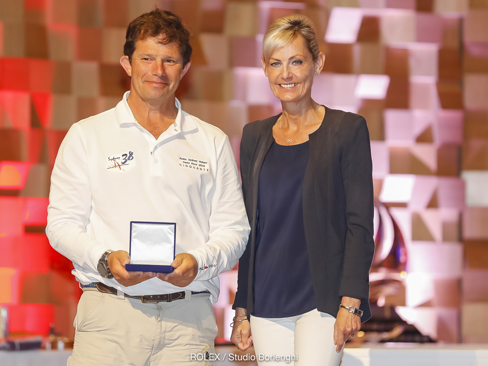 The Honourable Elise Archer MP presenting the Battery Point Trophy for first small boat across the line to Kim Jaggar’s Cinquante, which also won the CYCA Trophy for 2nd in the Corinthian Division