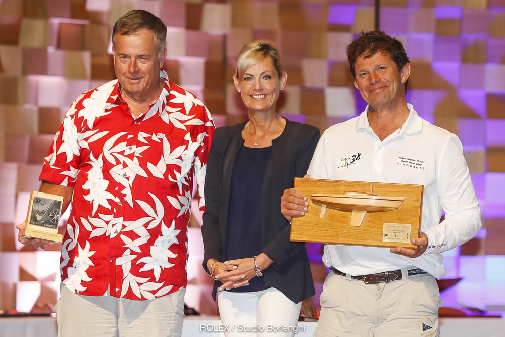 The Honourable Elise Archer MP presenting the Battery Point Trophy for first small boat across the line to Kim Jaggar’s Cinquante, which also won the CYCA Trophy for 2nd in the Corinthian Division