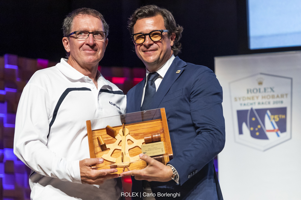 Memorial Trophy - Navigator of the winning yacht - Will Oxley, Ichi Ban.  With Rolex Australia General Manager Patrick Boutellier.