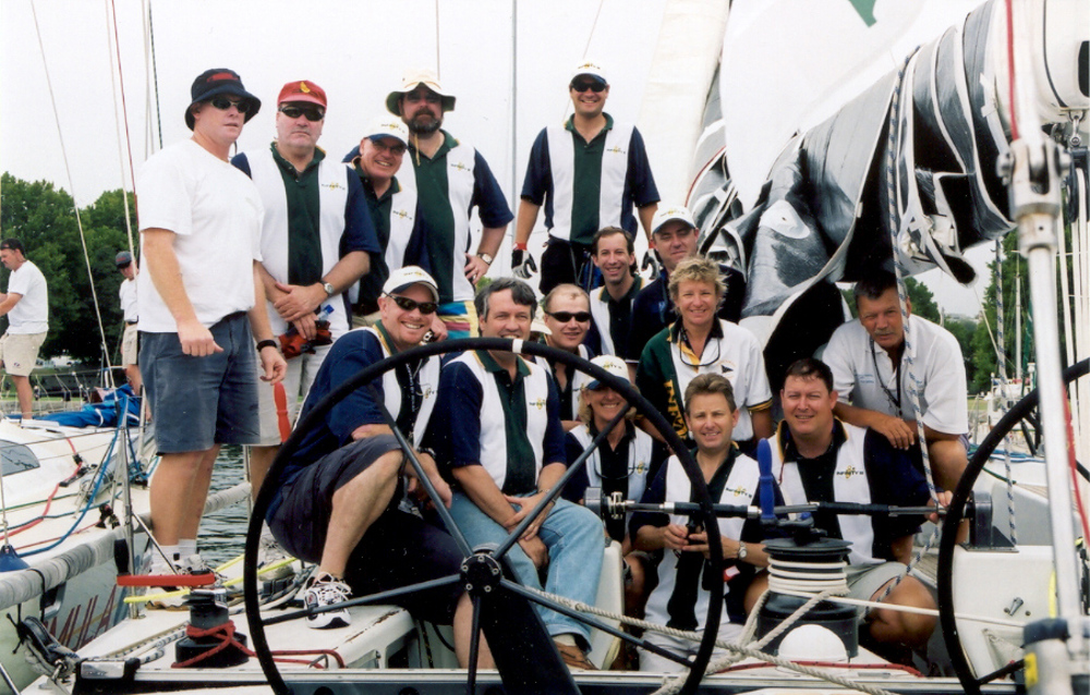Infinity III Sydney Hobart crew 2002 - (l to r from front) Peter Newell, Martin James, Tim Molchanoff, Pip Lavis, Louise Stevenson, Les Goodridge, Fred Etter, Ian Potter, Andrew Smith, Peter Bush, Geoff Lavis, Brett Smith, Adam Kilkeary, Federico Pogliano, Chris Flanagan