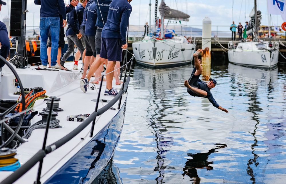 Celestial skipper undertakes the winner's traditional dunking