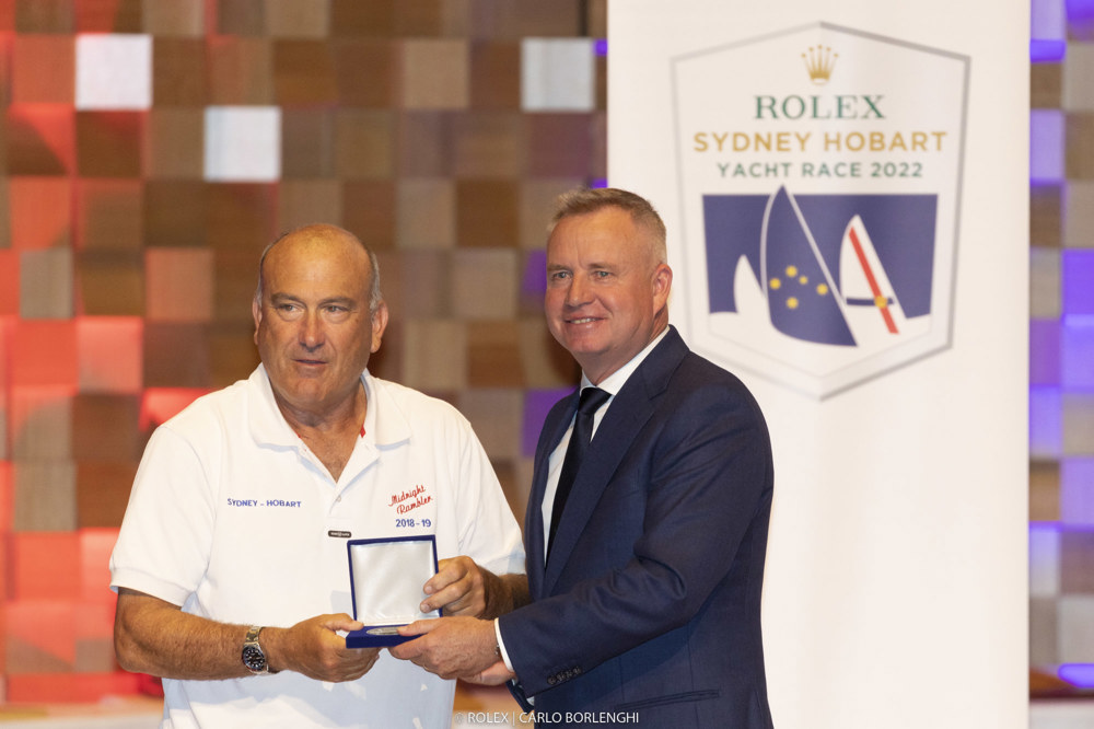 Ed Psaltis (owner/skipper, Midnight Rambler) collects his 40-race medallion from Jeremy Rockliff (Premier of Tasmania).