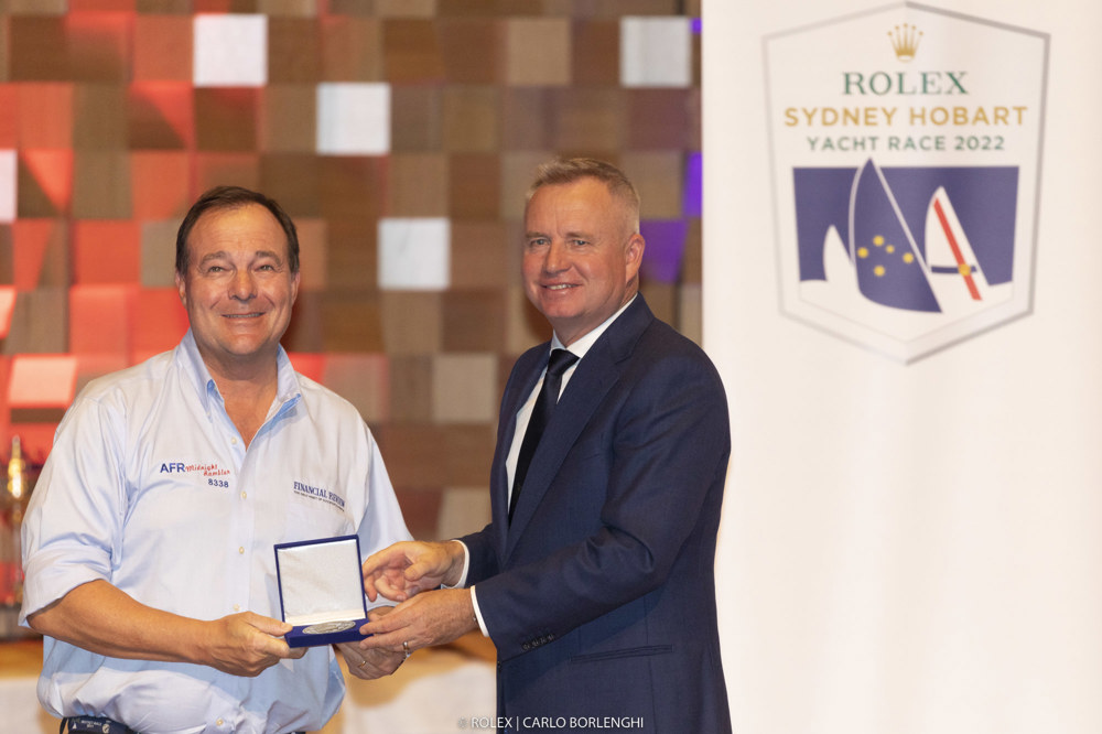 Michael Bencsik (Midnight Rambler) collects his 25-race medallion from Jeremy Rockliff (Premier of Tasmania).