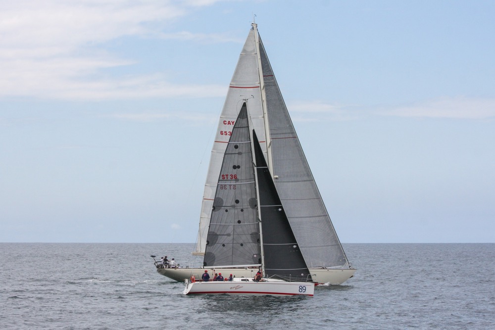 Midnight Rambler dwarfed by Oroton Drumfire, close to Cabbage Tree Island