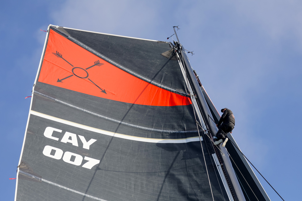 Crewman on Andoo Comache looking for breeze