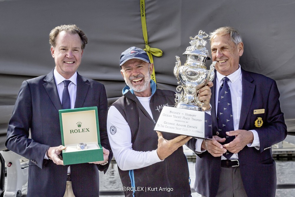 Prizegiving.
Benoît Falletti, Managing Director Rolex Australia, Duncan Hine, owner of Alive and Arthur Lane, Commodore Cruising Yacht Club of Australia.
ALIVE, Sail no: 52566, Owner: Duncan Hine, Design: Reichel/Pugh 66, Country: AUS