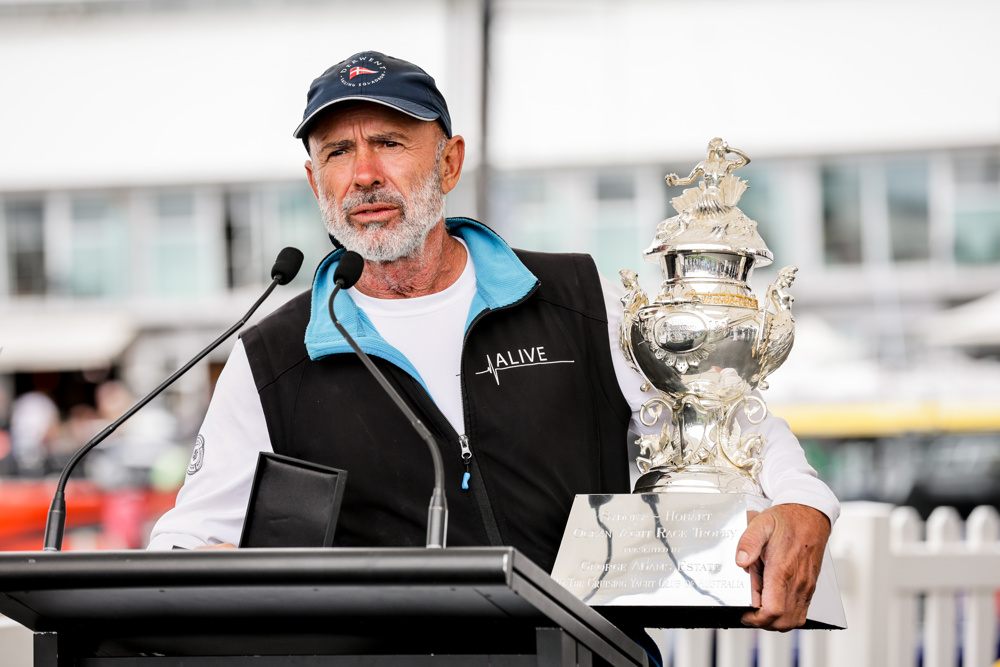 Skipper Duncan Hine speaking at the dockside presentation of the Tattersall Cup and Medallions to the crew of Alive