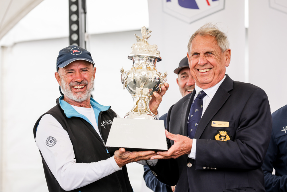 Alive skipper Duncan HIne with CYCA Commodore Arthur Lane and the Tattersall Cup for the Overall Winnner of teh Rolex Sydney Hobart