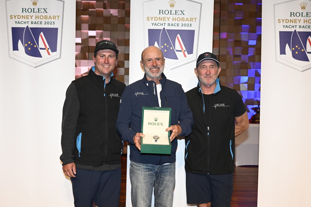 Alive skipper Duncan Hine and crewmembers with the Rolex Yacht-Master Timepiece presented to the owner of the winning yacht, Philip Turner.